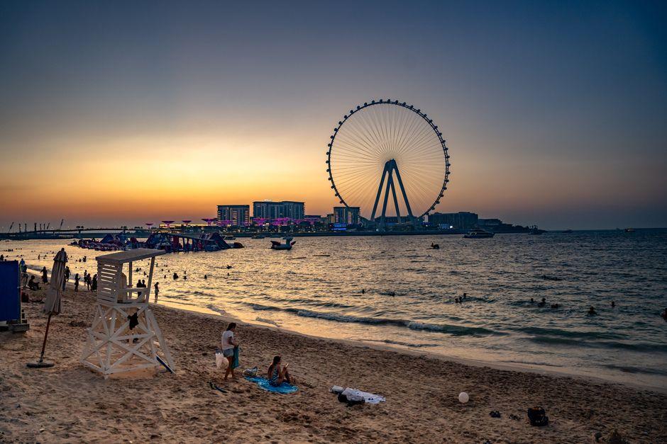 Sunset View of Dubai Eye Ferris Wheel at Beach